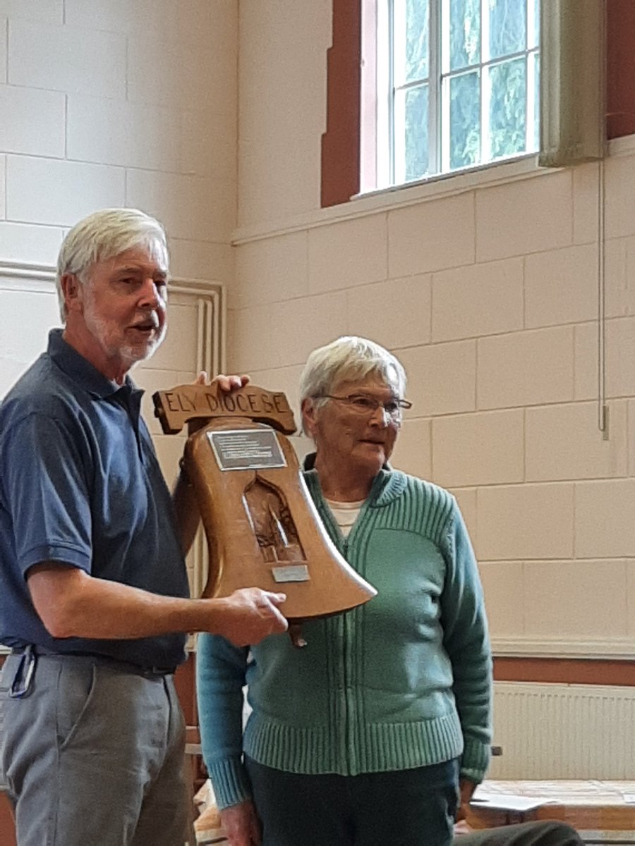 Success in the Association Striking Competition for the Hunts District. Photo of the conductor receiving the trophy. Two of the band were from Great Gransden.