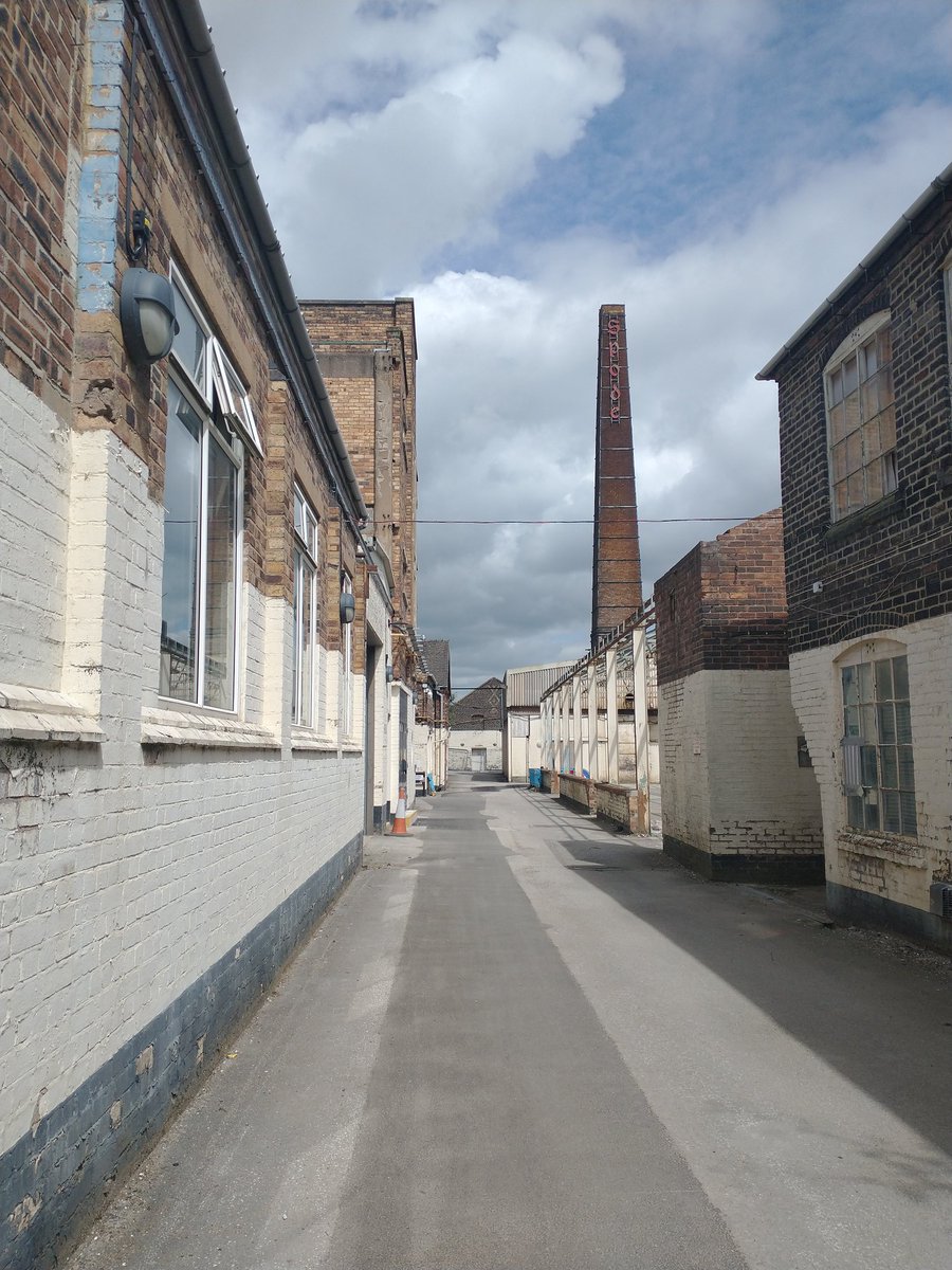 SpodeWorks's tweet photo. A peaceful moment in the avenue at #Sppde Works between the @ACAVASpodeWorks studios and @BCBfestival studio / China Hall. It won't be the same when the Meadows building (to the left) is demolished for redevelopment. https://t.co/TZjgc6v2Qp