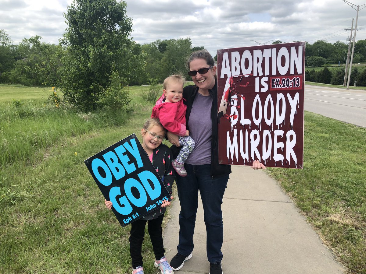 WBCTrumpet's tweet photo. ICYMI. Another 10! Olathe North HS #graduation2022 @onhsnews experienced #WBCSigns in the bright afternoon sun. These #graduates have received a steady diet of sin-enabling LIES. These words are their ONLY hope. #HardStop #FearGod #ObeyGod #ChristIsComing #MournForSin https://t.co/mdsamCpmTB