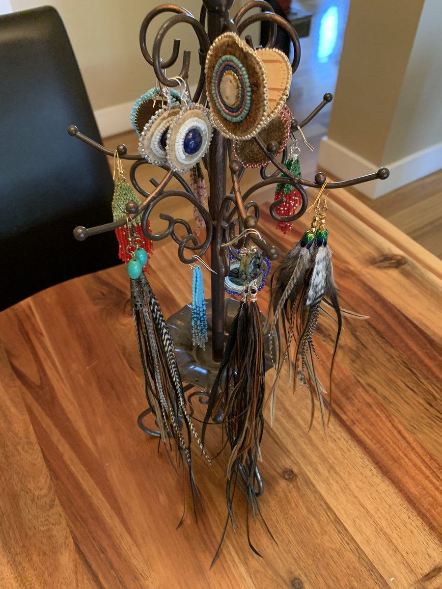 belindadaniels9's tweet photo. Earring sale, these are what I have left, picture on the right. #smokedmoosehide with antler &amp; gold beads, birch bark backing (personal fav) and a pair of rooster feathered earrings and strawberry brickstitch. DM is interested! #homemade #handharvested #smokedmoosehide #sterling https://t.co/5Oh2oChhFG
