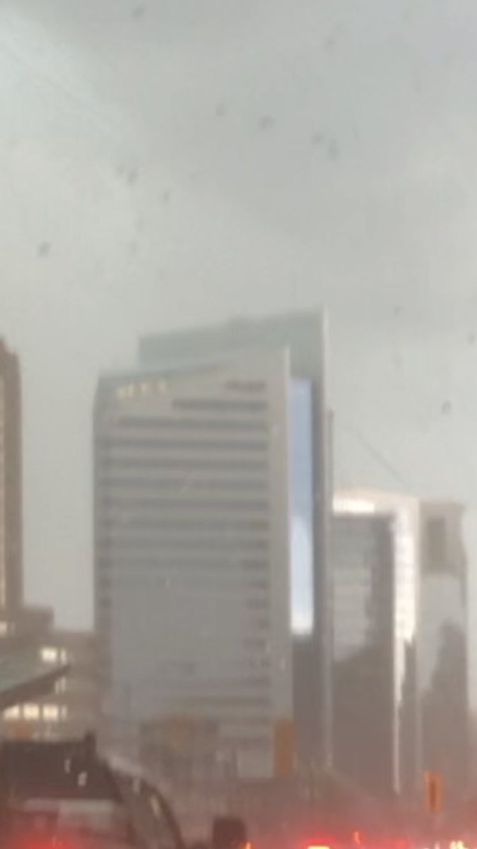JenAlexis6's tweet photo. Scary at Yonge and Sheppard this afternoon…I thought the car was going to join the debris in the sky! #ONStorm #Tornado #toronto #emergencyalertsystem https://t.co/0OOarsHxVC