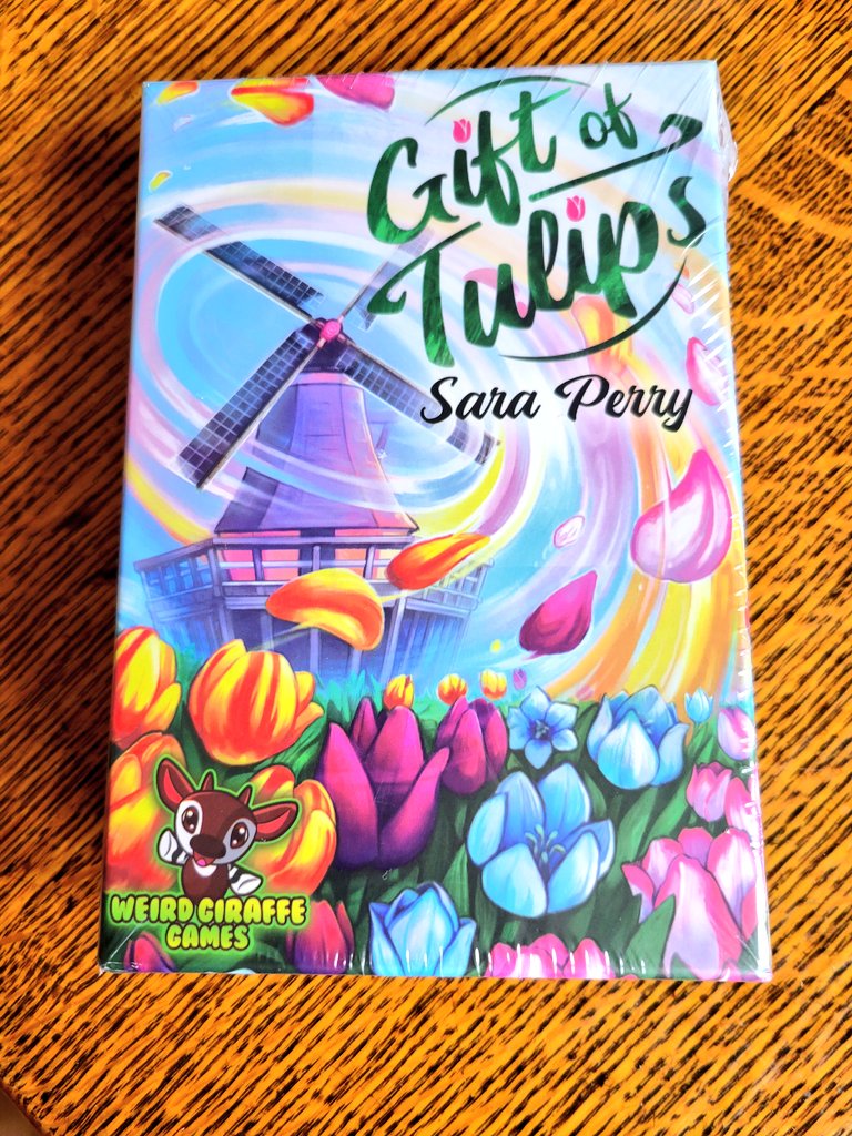 MFGCast's tweet photo. Look what came in the mail today! I can't wait to get this great game to the table again! If you haven't already, get your hand on a copy of Gift of Tulips! 🌷🌷🌷🌷@WeirdGiraffes @saraperry96 https://t.co/YPlI9CucC3