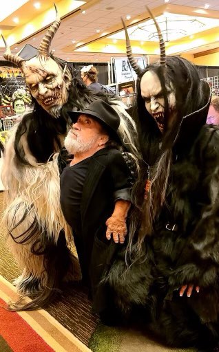 KrampusSeattle's tweet photo. Flattered that actor Phil Fondacaro asked his lovely wife to track us down so he could get a photo with us!  Dude we are YOUR fans! #willow #troll #landofthedead #garbagepailkids #sabrinatheteenagewitch #starwars #talesfromthecrypt #philfondacaro #crypt22 @crypticon https://t.co/zUPQZYeeQo