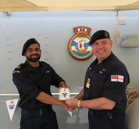 We recently welcomed @CDRETNEILD, Commodore Surface Flotilla onboard HMS Bangor. During his visit he congratulated ET(ME) Jaseel on his promotion to ET1 and awarded him his ET1 badge 👏 #OpKipion #Continuous15