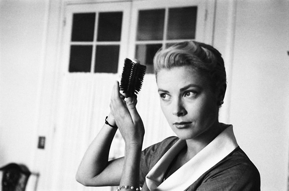 grace kelly at her hotel suite in cannes, 1955