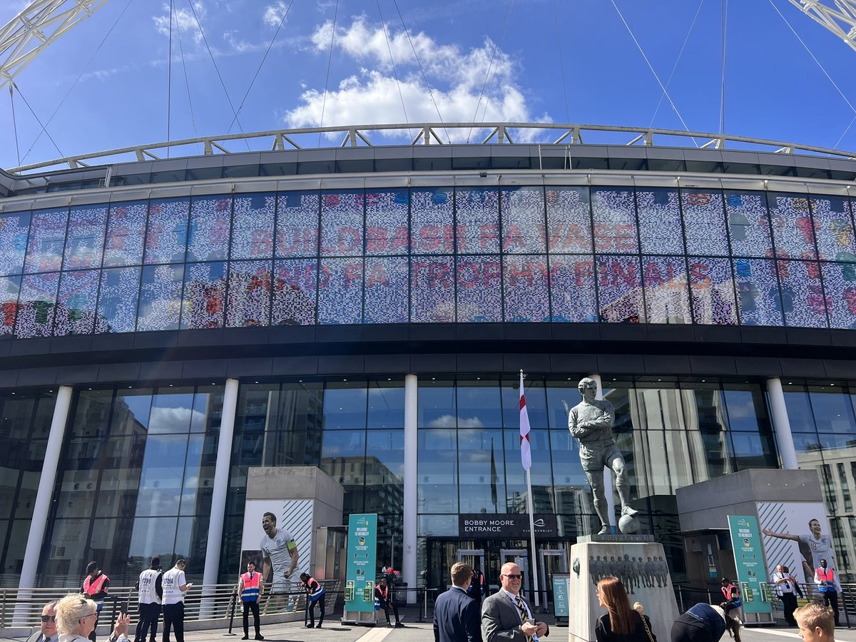 LittlehamptonFC's tweet photo. We have arrived at the Bobby Moore statute outside Wembley Stadium #BuildBaseFAVase https://t.co/0idT5EVOYv