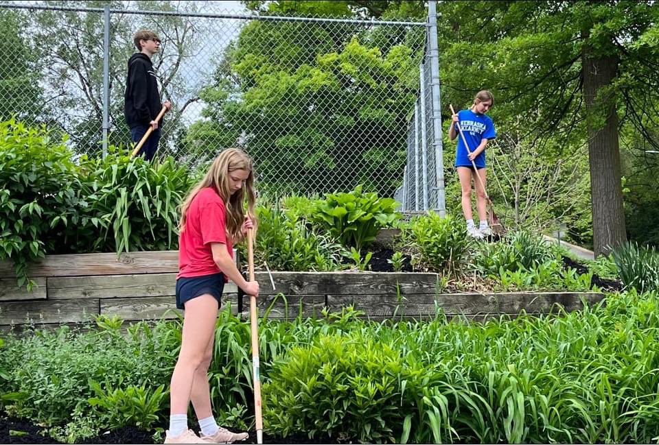 The @SMMschoolOmaha 2022 graduates did a great job mulching the garden!