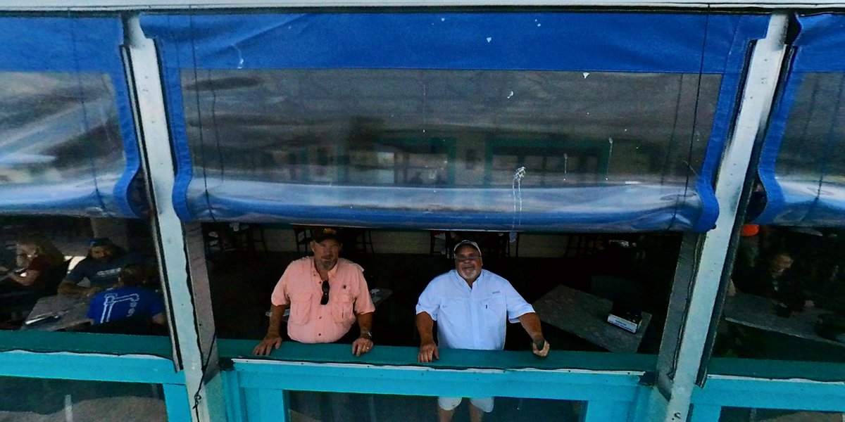 JohnJackMcGill's tweet image. Lunch with some of my friends...Graham, booster B1052, drone ship "A Shortfall of Gravitas" and a pair of unexpected dolphins all meeting up at #Fishlips restaurant in Port Canaveral before OFT-2!