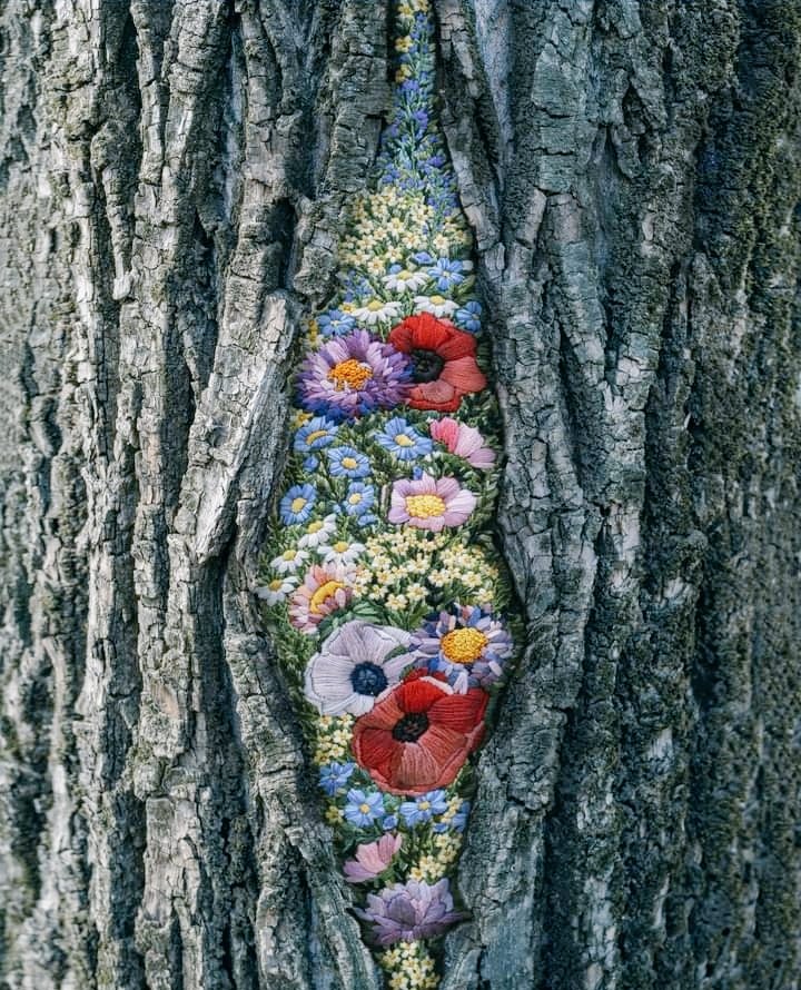 Contemporary artist Diana Yevtukh often displays her embroidered textile art within nature #UnravellingWomensArt