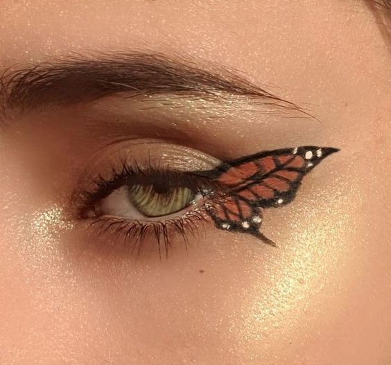 This butterfly wing makeup look is so pretty