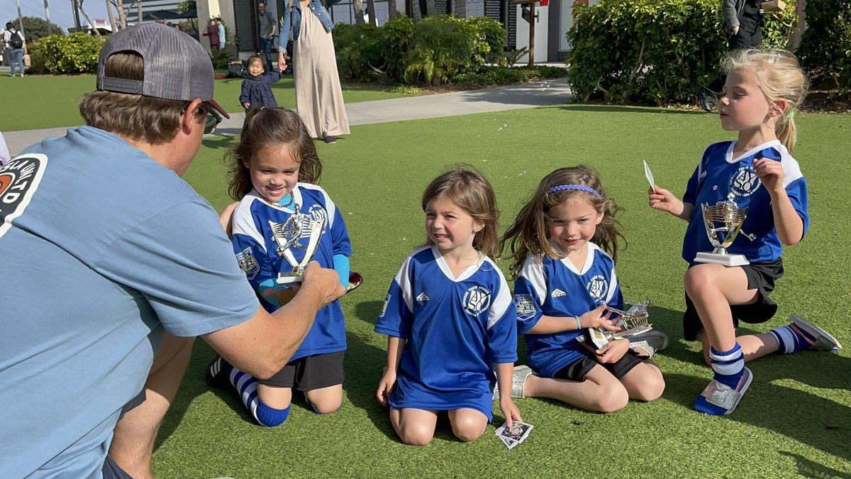 herculezg's tweet photo. Waited till her last game of the season to score her first goal (may or may not have used her hand to set it up) ..

No VAR so goal stood 😋

Bagged a brace.. then Ice cream and trophies. 

Thanks AYSO. ☀️ #BlueWave https://t.co/da7P679LV5