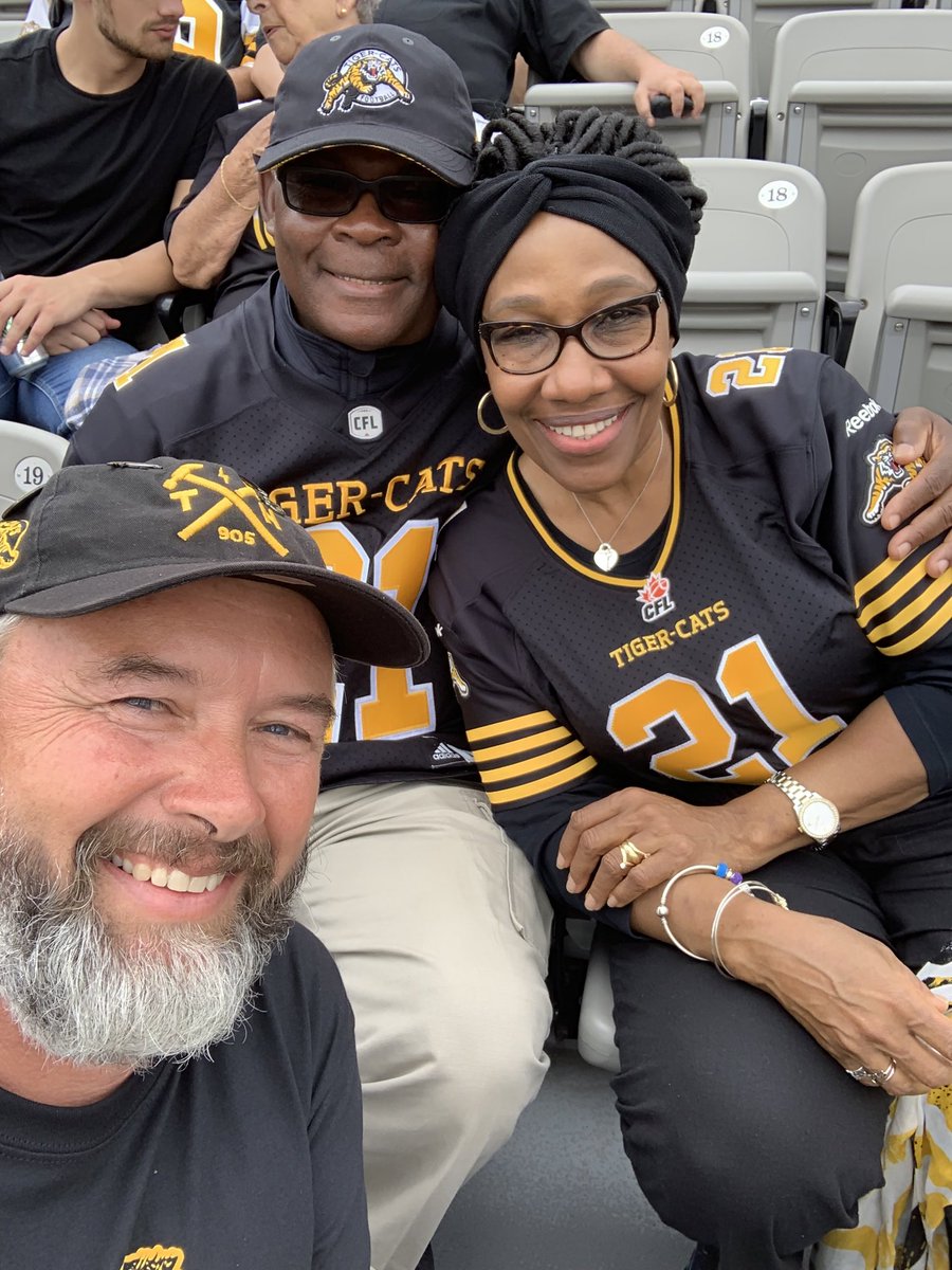 wally_walker's tweet photo. i sit in section 102 at @TimHortonsField. it’s also the section where the #TiCats family & friends sit. you can tell where a specific player’s posse is sitting because of all the jerseys being worn. it’s always nice to run into @Simoni_Lawrence’s parents. #pic4 #CFL #CFLmemories https://t.co/6rYkVIHLws