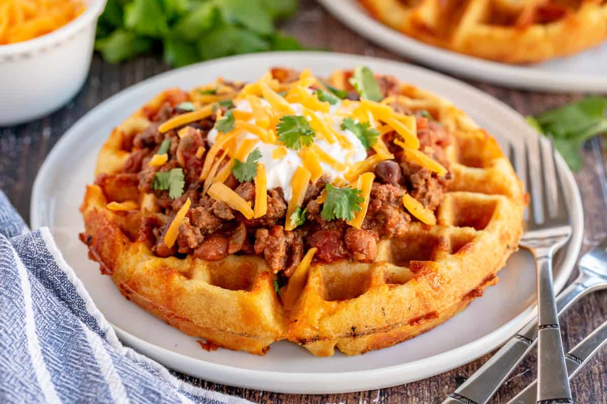 kyleecooks's tweet photo. A fresh take on your traditional waffle, these savory Cheddar Cornbread Waffles are the perfect vehicle for chili, and so much fun to eat! #cornbread #waffle #savory #kyleecooks https://t.co/PhVOv68JKU https://t.co/JOT86BI2Di