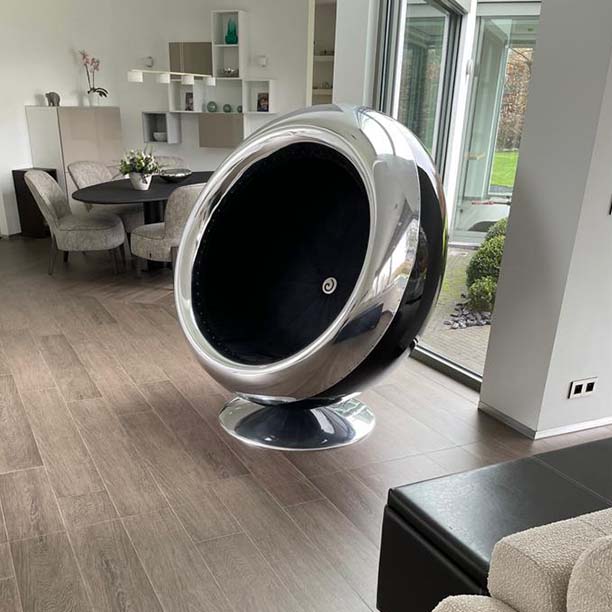 Our BAe-146 Chair in double black. Made from an authentic BAe-146 engine cowling, mirror polished paired with a beautiful alcantara upholstered interior and gloss black shell.