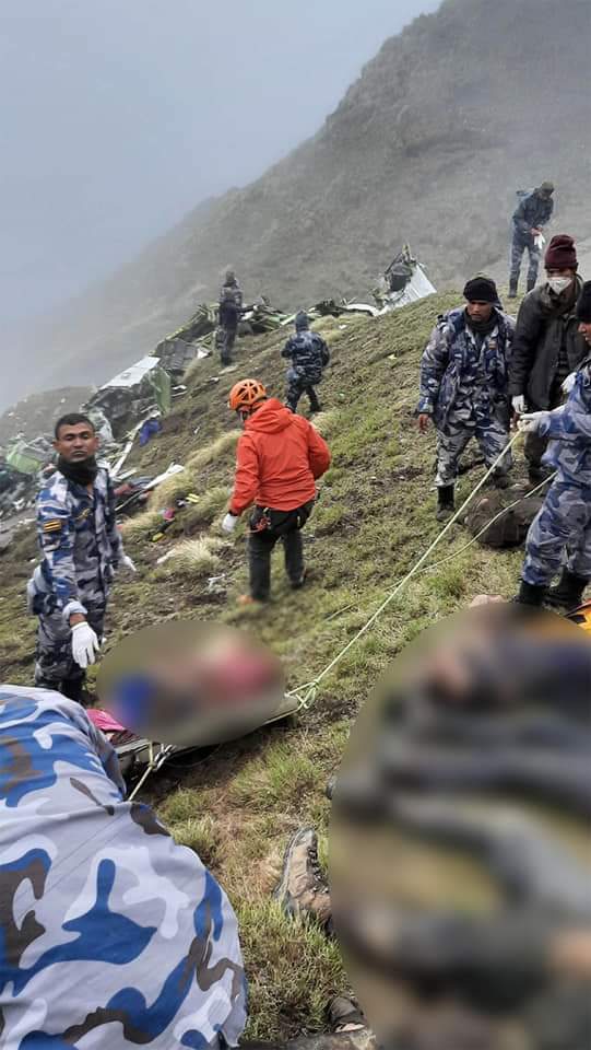 MotiItani's tweet photo. Security personnel are collecting the bodies of those killed in a Tara Air plane crash. Tara Air 9N-AET Twin-Otter aircraft flying for Jomsom crashed on Sunday morning at Sanosare Bhir in Thasang Gaonpalika-2, Kowang, Mustang. https://t.co/GEFBzj0hae