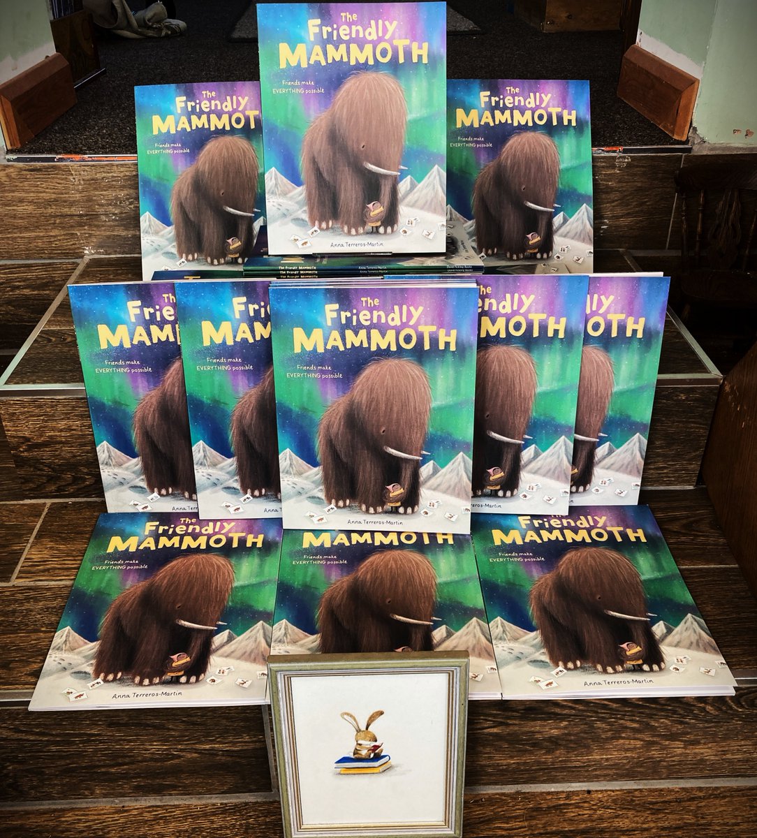 Therabbits21's tweet photo. A busy little bookshop today with @anna_terreros transforming our window ready for the launch of #TheFriendlyMammoth and @andreafelliott will be here for an event at The Angel Suite this evening about  #InvisibleChild Very lucky  Rabbit's today. Thanks to everyone involved. https://t.co/ikK9Pxu9gQ