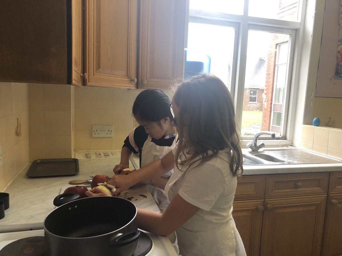 Oak Class are busy making apple crumble on their residential at St Felix School