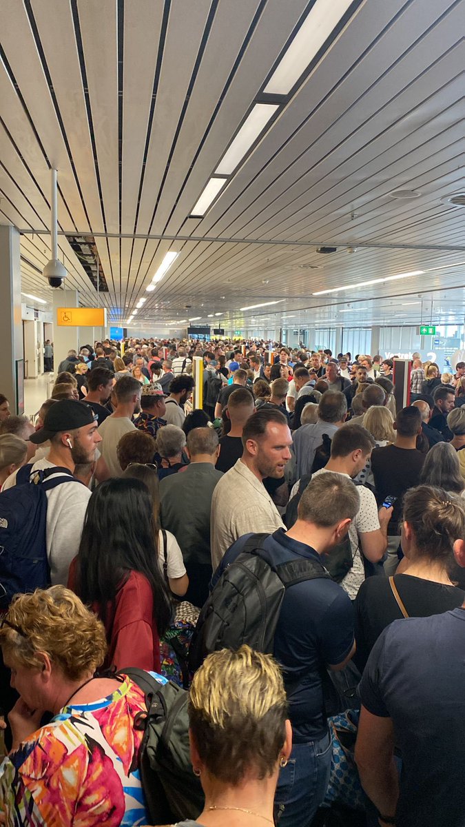 BellsyB's tweet photo. @Schiphol  Any update on crowd management at the airport today? The queue to get through to security has taken over 3 hours causing flights to leave the airport empty as everyone is stuck at security. This is flight KL0645 departing without the majority of its passengers… https://t.co/lMcybyqF9q