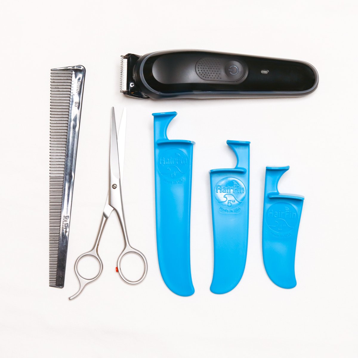 The HairFin guides are super portable. All you need is a pair of scissors or a beard trimmer and you can cut hair anywhere! #madeinusa #Haircut  #haircutmen #haircutsforwomen