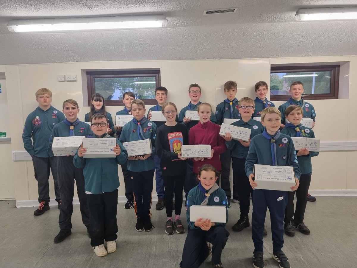 Scouts creating boxes to send to Ukraine on Friday!