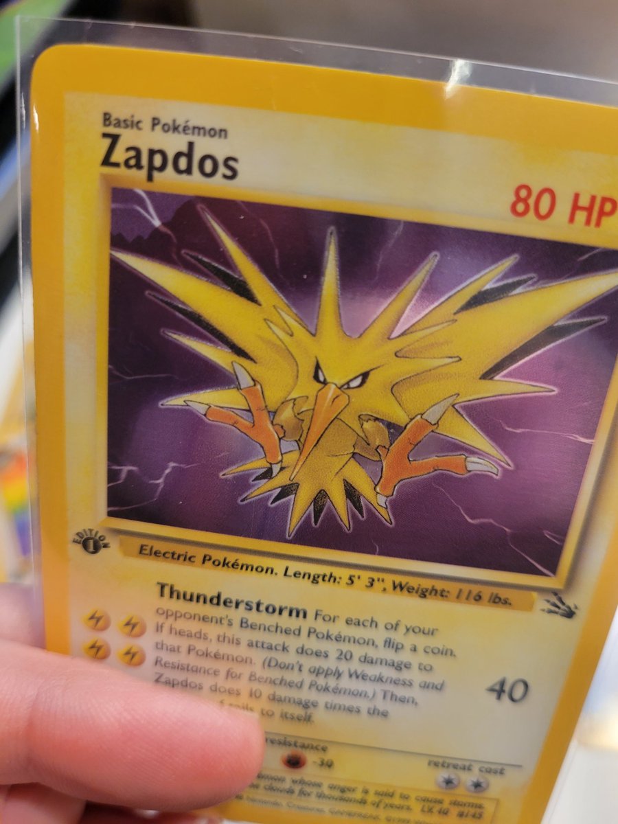 Brittzers87's tweet photo. Help me out #pokemon community! I was going through some bulk (since I found #Charizard cards I forgot) to see if I could find anything and I came across these #errorcards. I know about the jungle sign, but has anyone had these? #Zapdos missing foil & #Pelipper miss-cut/ misalign https://t.co/jyQmDMUh3Z