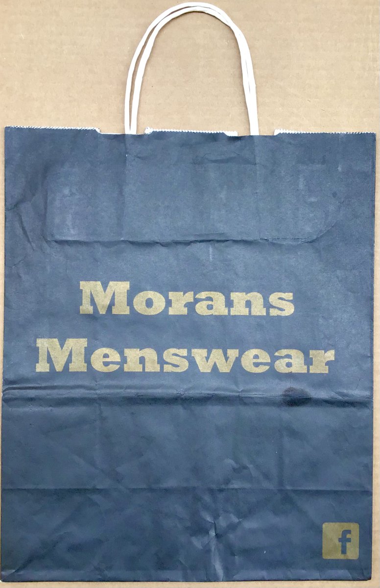 OldThurles's tweet photo. The evolution of the Moran’s Menswear bag, Friar St., Thurles, from plastic to paper. Paper &amp; card so much better. 🕴️@Designedly_ @ThurlesChamber @LegoLostAtSea @TippStudies https://t.co/I0n2AMCc08