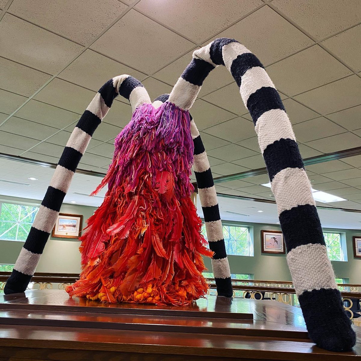 LibraryEdgewood's tweet photo. 😮New art in the library!

Where our somber wooden Madonna and Child sculpture used to reign at the top of the stairs, a snazzy new art piece now surveys the second floor: ✨Oblio✨ by Jean Stamsta (1936-2013), Milwaukee-based fiber artist from Monches, WI!

🔳🔳🟧🟥🟪🔳🔳 https://t.co/kPfLHwscVd
