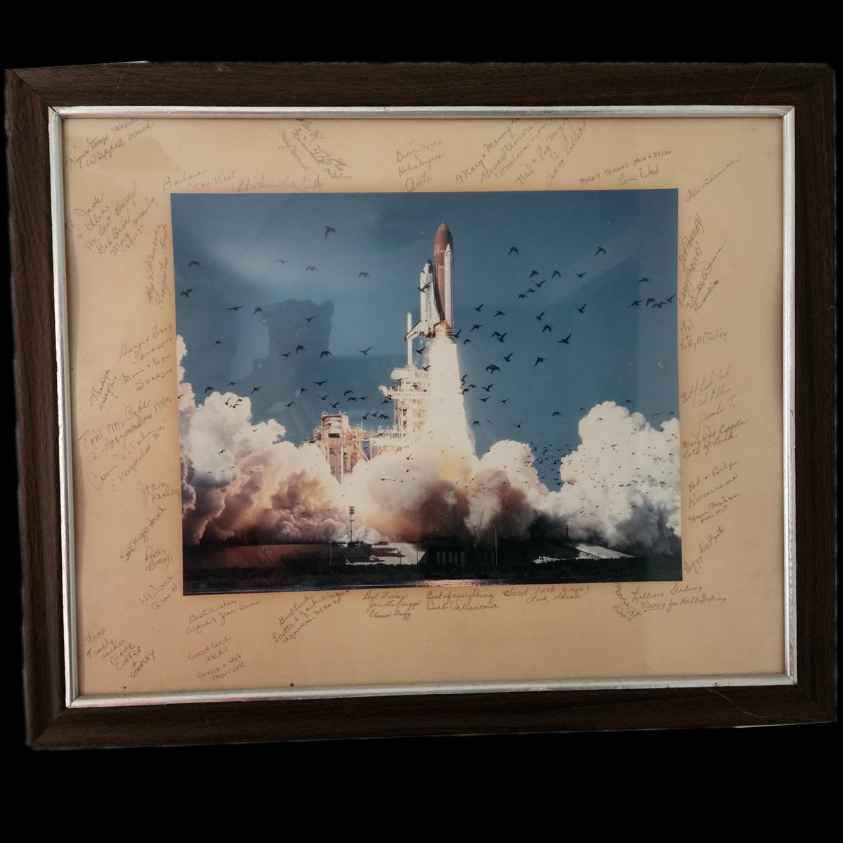 QFamilyFound's tweet photo. Picture of the shuttle launch signed by my grandparents friends from when they lived in Coco Beach ⛱️ 
@SpaceX 
@elonmusk https://t.co/pc4Ns3Uggv