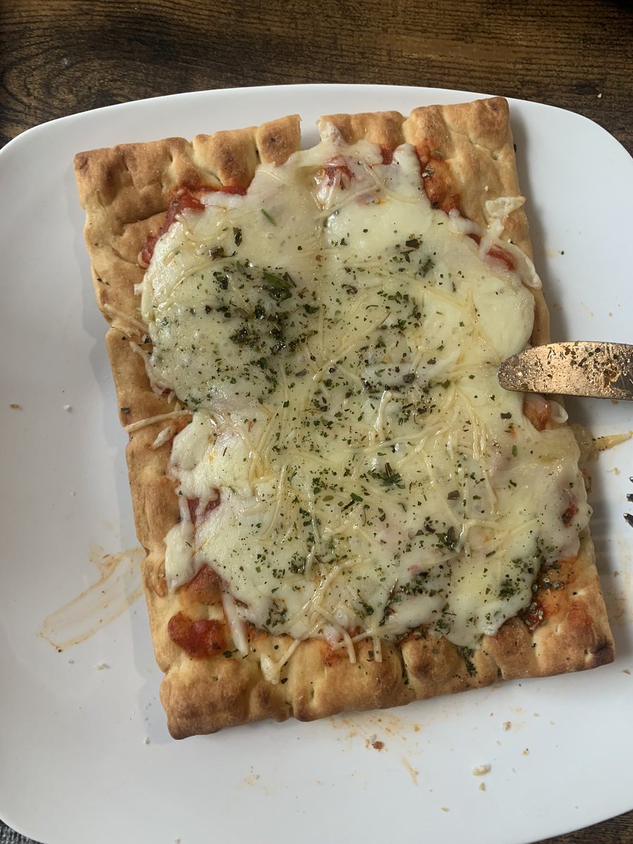 alison_bomb's tweet photo. I made this flatbread thing and I can’t stop thinking it looks like a giant pizza poptart https://t.co/NHkCBsxOhX