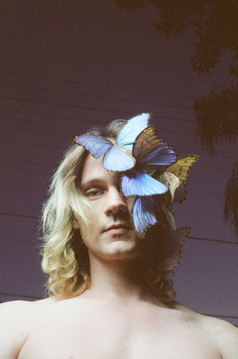 whitneyotte's tweet photo. Butterflies on the love of my life @Schnuckumz 
Shot on @CineStillFilm https://t.co/5Y9DHlklRA