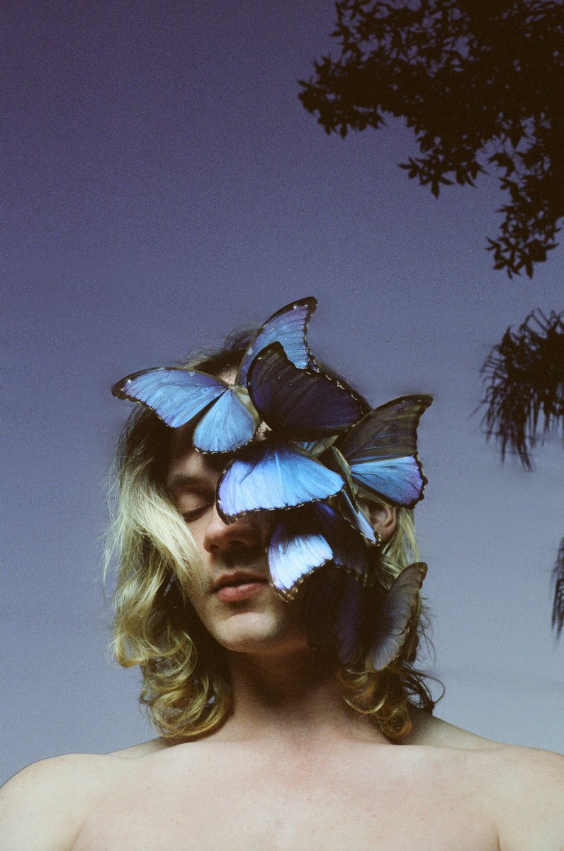 whitneyotte's tweet photo. Butterflies on the love of my life @Schnuckumz 
Shot on @CineStillFilm https://t.co/5Y9DHlklRA