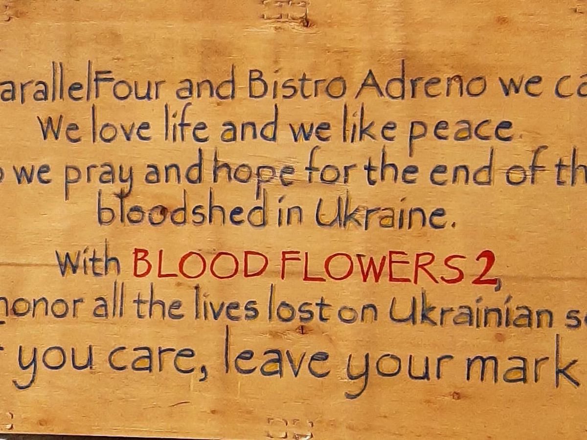 TimKipchumba's tweet photo. At @PHostels and Bistro Adreno we have created this wall so that you &amp;  us can show we care. We love life &amp; peace. So we pray &amp; hope for the end of the bloodshed in Ukraine. 

With BLOOD FLOWERS 2, we honor all the lives lost on Ukrainian soil. Come, leave your mark. https://t.co/8Zp8EimFRC