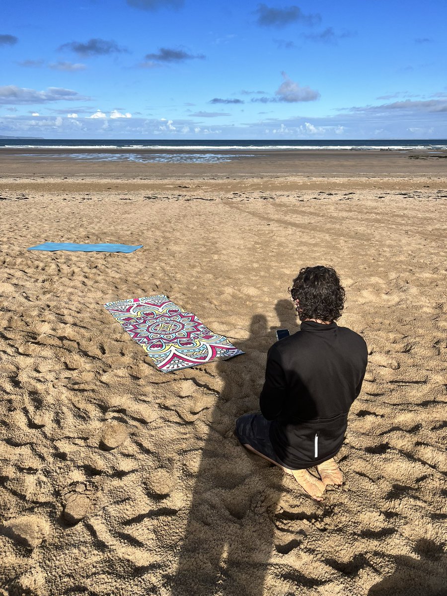 Early morning beach yoga with <a href="/BayFitness/">Andrew Blake</a>