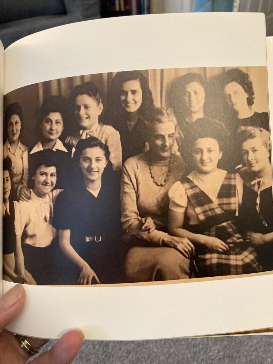 This photo shows Marie Paneth, the Art Therapist, English teacher, Youth Worker, amongst a group of young women Holocaust Survivors. The toll  of the role on her health can be seen here.

Marie is the only figure unable to look into the lens….. A truly remarkable photograph.