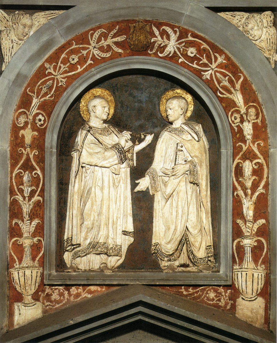 La coppia di santi Cosma e Damiano sono rilievi in stucco policromo realizzati da Donatello all'interno della Sagrestia Vecchia nel decennio tra il 1433 ed il 1443.