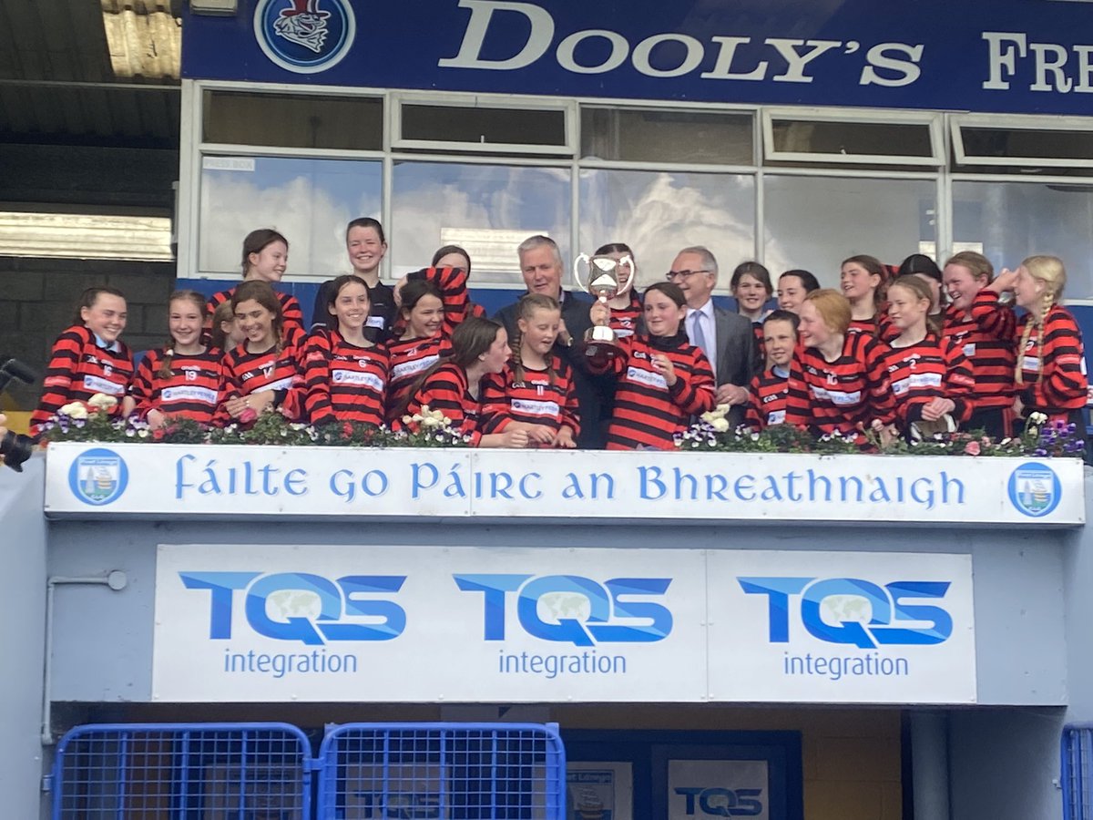 ballygunnerHc's tweet photo. Zara Barry Captain St Mary’s Ballygunner NS camogie lifting the school’s cup sponsored by Oliver Murphy Insurance after a 3-06 to 2-02 win over Butlerstown . https://t.co/7CnzCsLSof