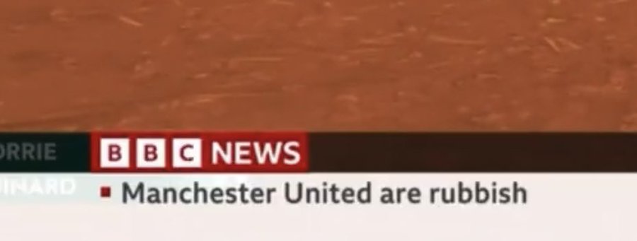 BBC News ticker with the words “Manchester United are Rubbish” on the screen