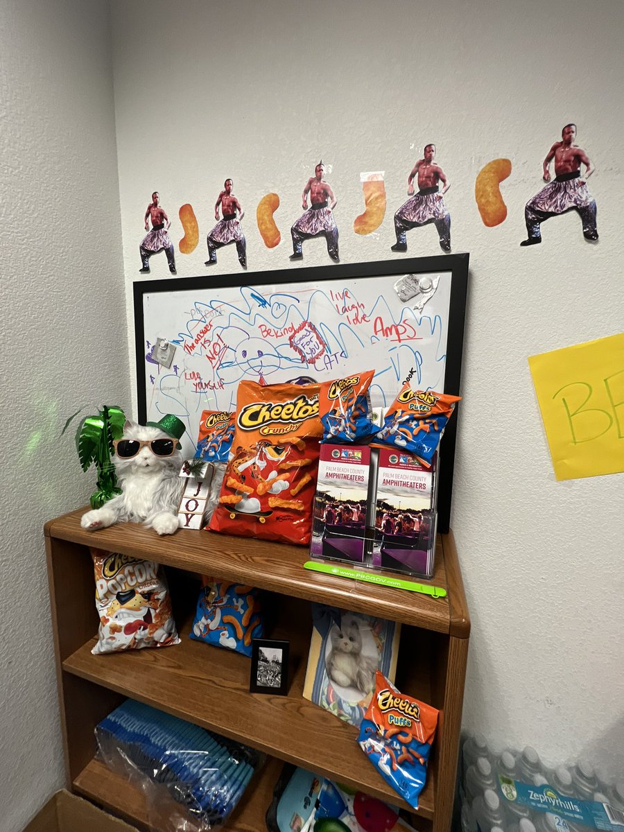 OnAirWithEmily's tweet photo. For my birthday…my coworkers decorated my office as if @ChesterCheetah had an art installation at the Met. I’m dead. 🥰😍 https://t.co/BLb2F58ray