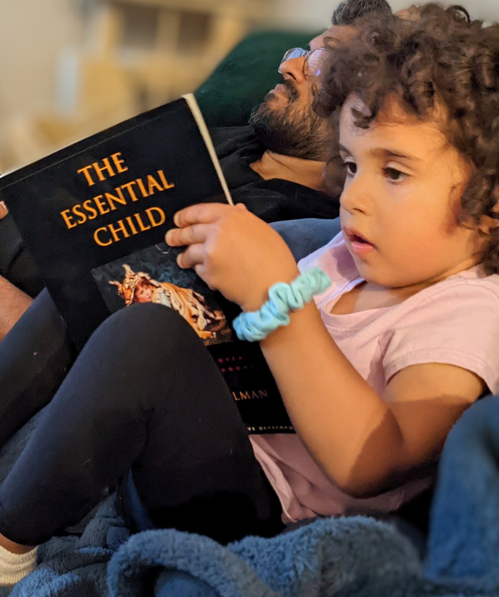Check out this cute picture of Olive, daughter of Dr. Rachel Fine (CDL lab alumna), reading Dr. Susan Gelman's book 'The Essential Child'!