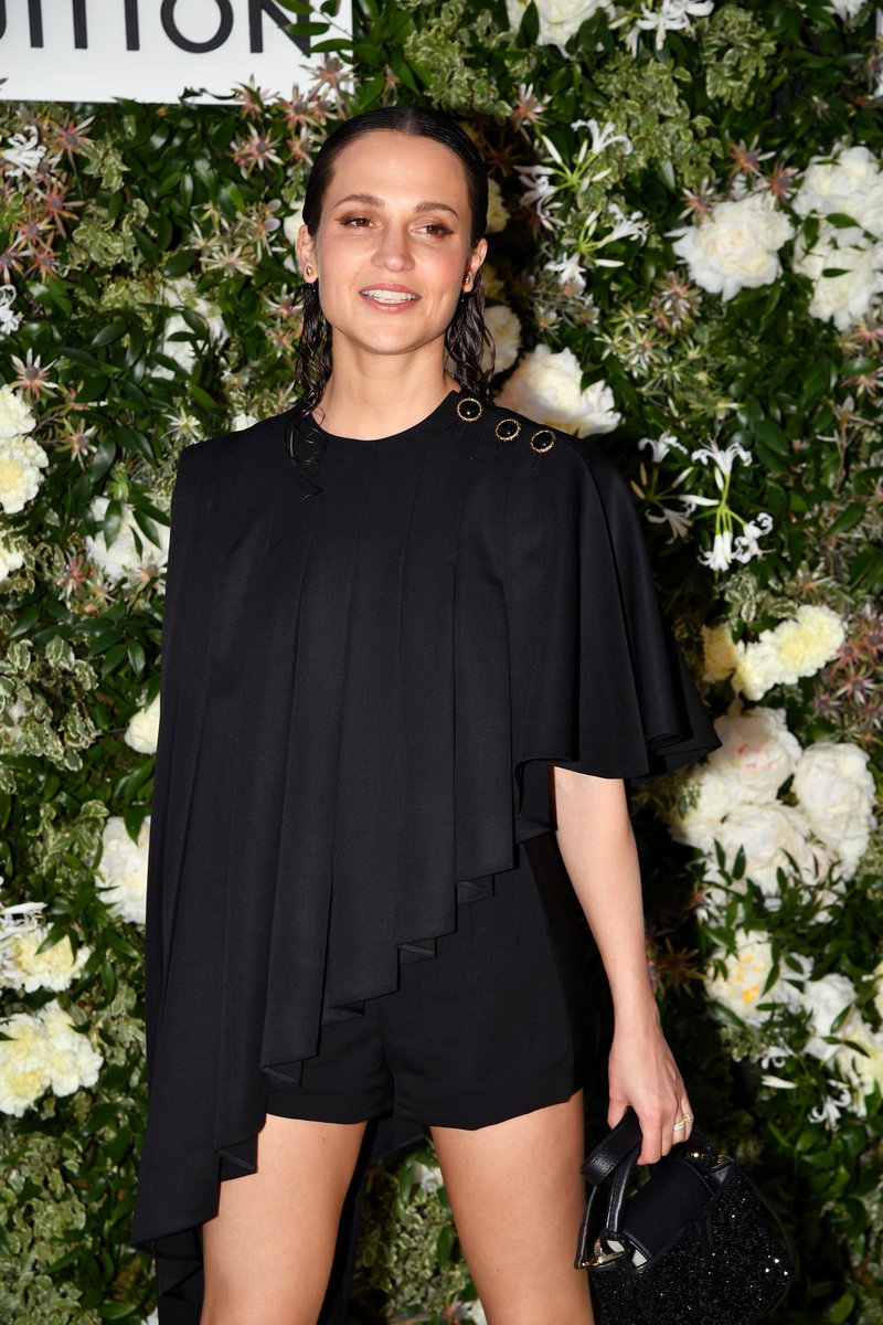 alicia vikander at the louis vuitton dinner during the 75th annual cannes film festival