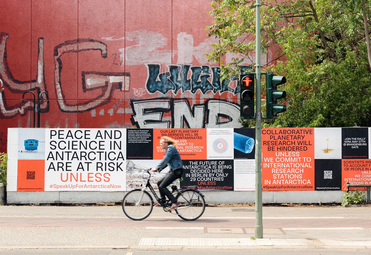 oboylephoto's tweet photo. One of my McMurdo Station photographs (you can sort of see it behind the cyclist) is participating in the #SpeakUpForAntarcticaNow campaign in Berlin Germany during the meeting of the Antarctic Treaty Consultive Meeting, where the future of Antarctica can be decided. https://t.co/YAJ6tU8GO7