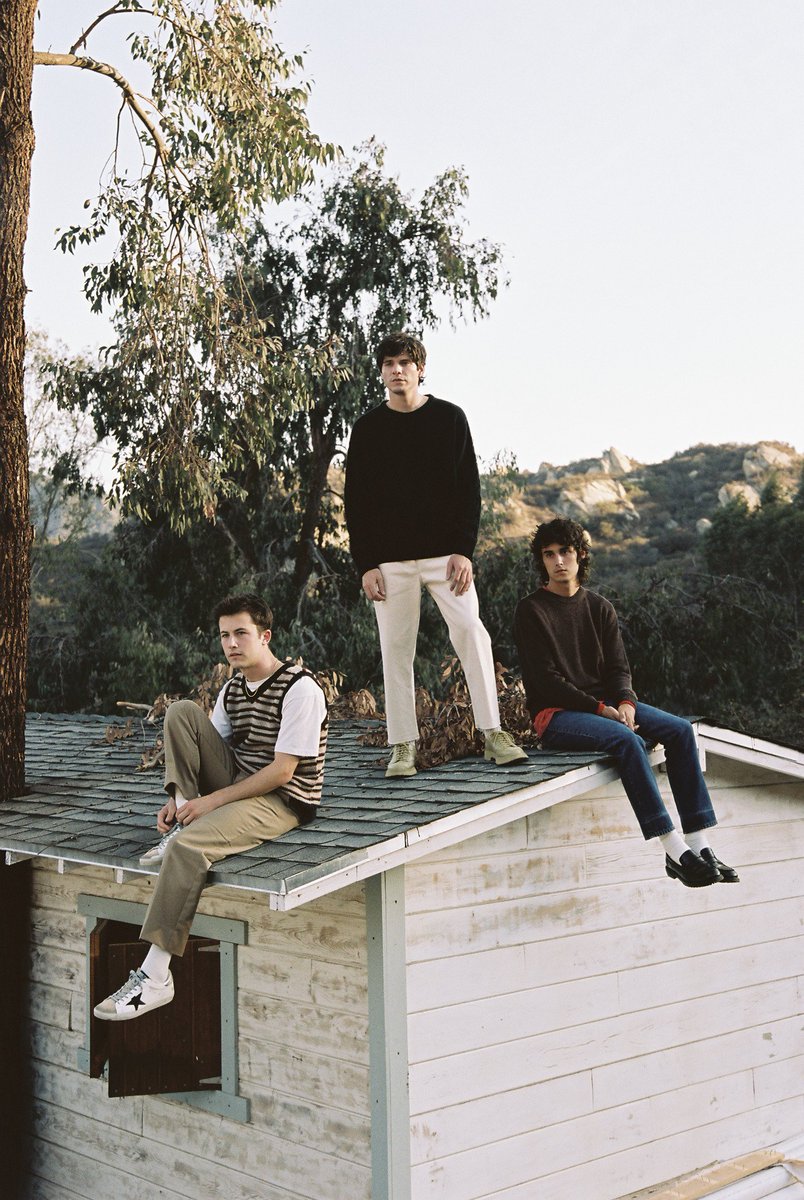 chillenceo's tweet photo. wallows 'tell me that it's over' album photoshoot is so pretty 🌻 https://t.co/gRTZvg2lb5