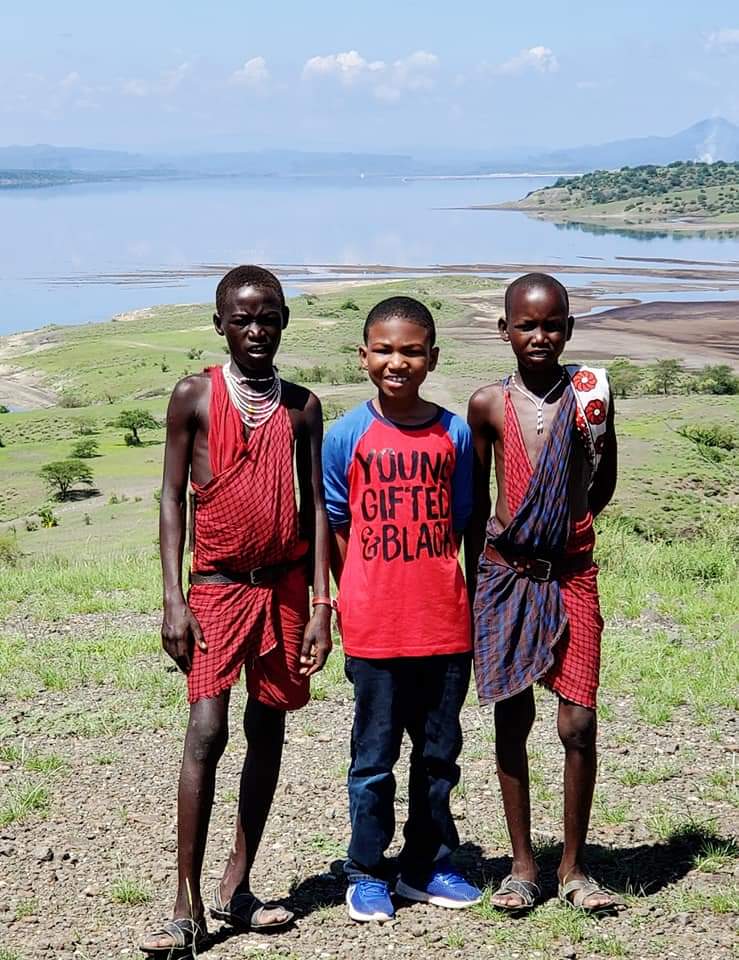 BeyondWellCoach's tweet photo. This is my son, in Kenya Dec 2019, w/ 2 Masaai boys. 

In the Masaai culture, a traditional greeting translates to: "How are the children?" Because if the children are alright that means there is peace and safety within the community. 

To the United States: HOW ARE THE CHILDREN? https://t.co/sW0051nNIT
