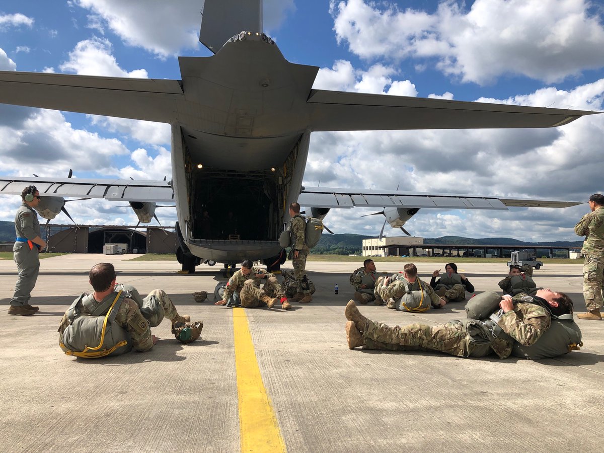 stripesktown's tweet photo. Chilling out before flight time. Army paratroopers from Germany and the States waiting to board a C130. They’ll jump onto a drop zone on Ramstein, part of 37th Airlift Squadron’s anniversary commemoration. https://t.co/GpuSiR5F6J