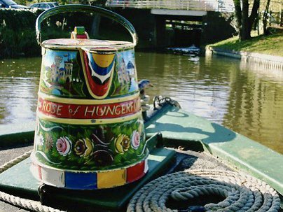THE ROSE REMEMBERS - Buckby cans, used to carry fresh water on working narrowboats, are reputedly named after Long Buckby village. Most boats now have water tanks so these lovely, traditional items are mostly decorative. Our ‘well used’ can is always on the roof during trips.