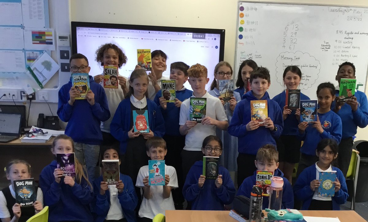 Opal Class posing away with their brand new class books we brought with the money donated to us from the sponsored skip. #edithcavell #edithcavellprimaryschool #ecps #opal #year5 #year6 #booksforbugs #dogman #dogmanbooks #littlebadman #humzaarshad #mosalah #cristianoronaldo