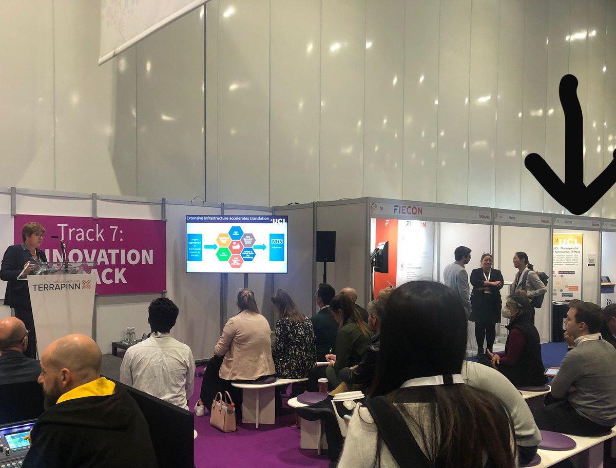 UCLTRO's tweet photo. Translational Research Group Head, Dr Pamela Tranter, provides an impressive overview of translation at UCL, outlining how we’re inviting others to join our Therapeutic #Innovation Networks (TINs). See us at stand 13 (see arrow, photo 2 below ⬇️) to get involved! #AdTherapies2022 https://t.co/bAQe0GDEXt
