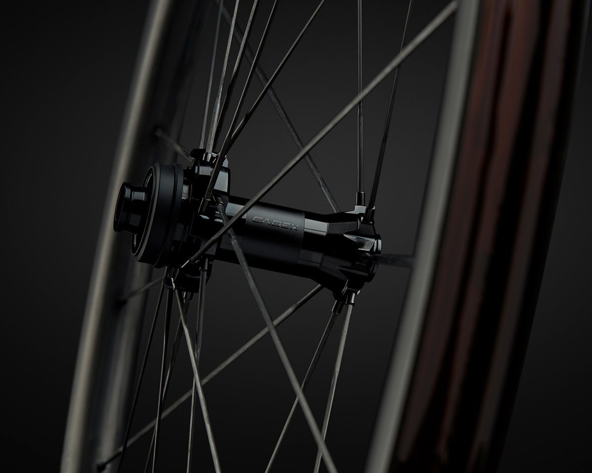 CADEXCycling's tweet photo. An integrated front hub design reinforces axle support and eliminates play by replacing the standard end cap, bearing and bushing interface with an integrated axle running the length of the hub.

Find out more → https://t.co/DQju3Wn24C

#EffortInSpeedOut https://t.co/3gcYE6HVpa