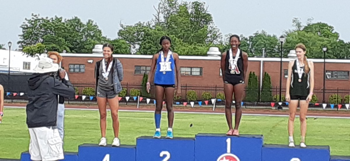 Ellen Driver on the girls triple jump podium; 4th place. Great job making your last jump your best jump!