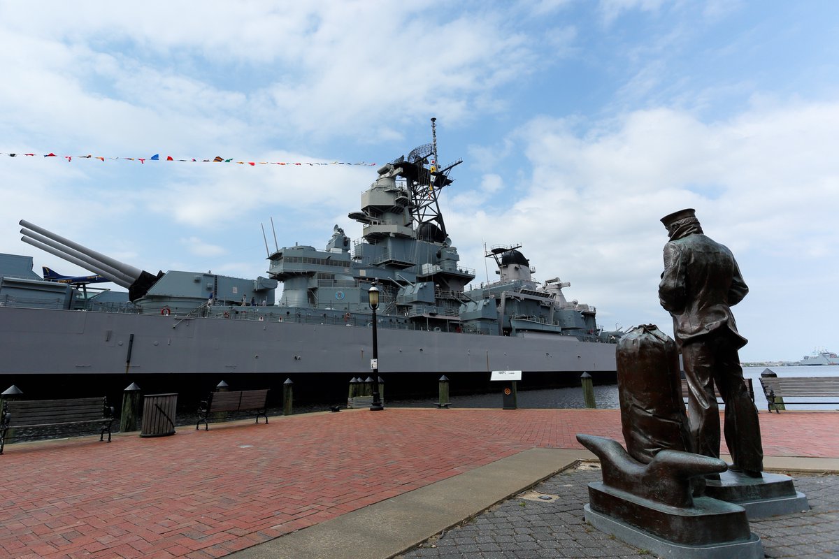 USNavyMemorial's tweet image. The Lone Sailor Statue in #Norfolk VA was dedicated 20 years ago today! This statue stands watch near the Battleship #USSWisconsin and is surrounded by 8 commemorative plaques of Norfolk-based ships and submarines.